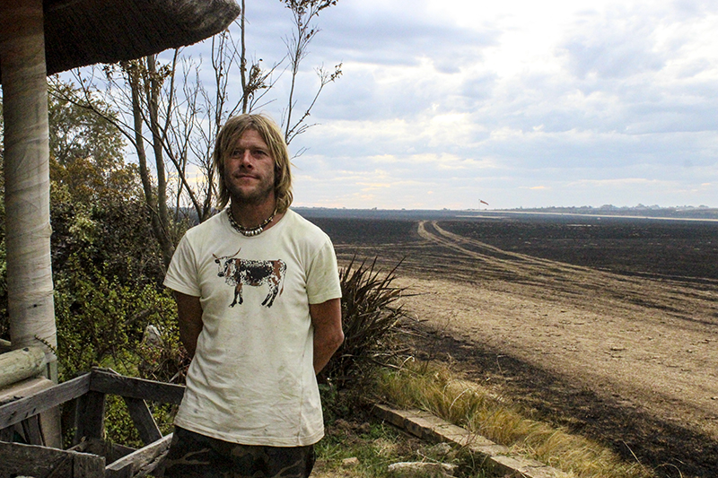 Sean Haydock, who runs Blue Skies Backpackers, raised the alarm when he saw the fire approaching from the far side of the airfield, between the army base and the shooting range.