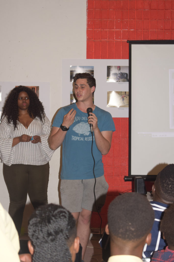 Rhodes Photojournalism student Daniel Goldberg speaks about his three-month photo partnership with Nombulelo learners at the Masazaneni Exhibition at the Joza Youth Hub last Friday. Photo: Michelle Banda