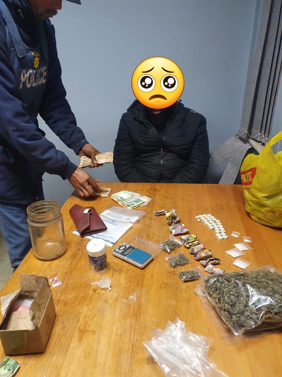 Police confront the suspect with his drug stash. Photo: supplied